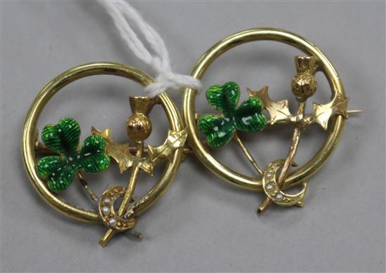 A pair of yellow metal, enamel and seed pearl set shamrock and thistle openwork circular brooches, 21mm.